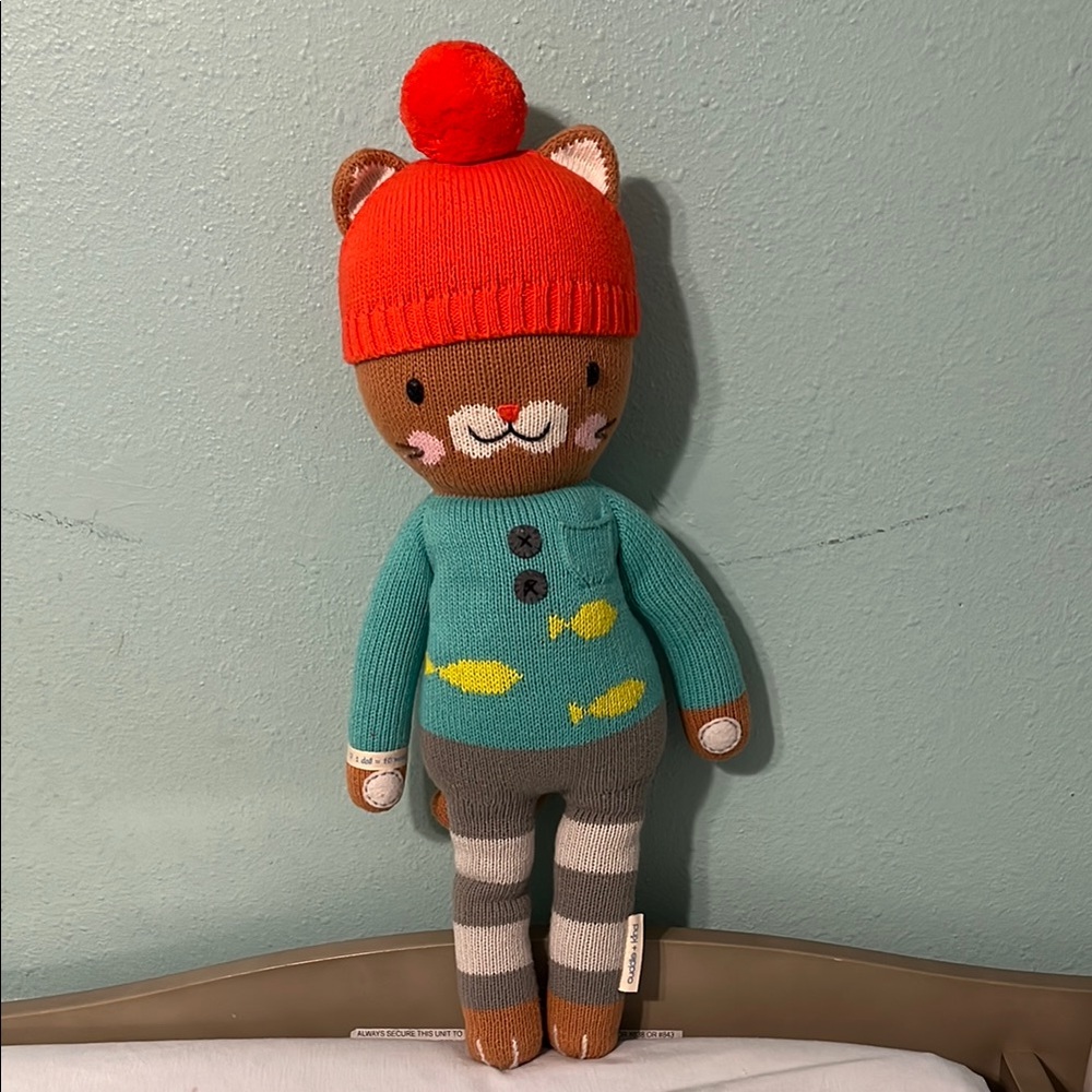 Charming Red and Green Stuffed Animal with Knit Cap